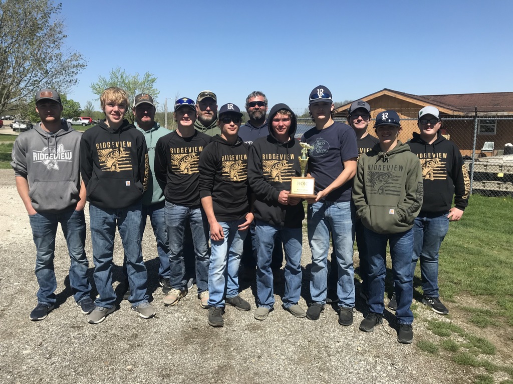 Bass fishing team with HOIC trophy