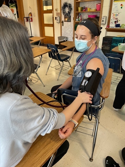 Students learning to take Blood Pressure readings
